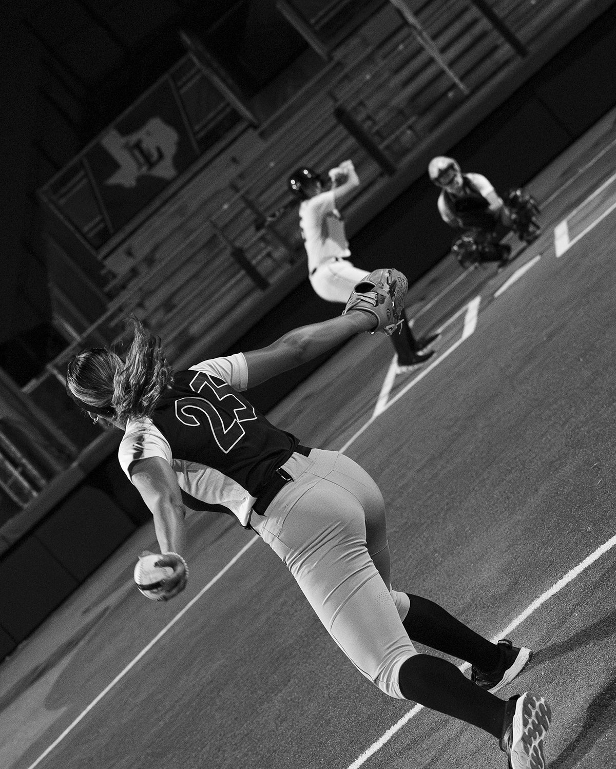 A black and white photo of Team Stalker Sport playing softball.