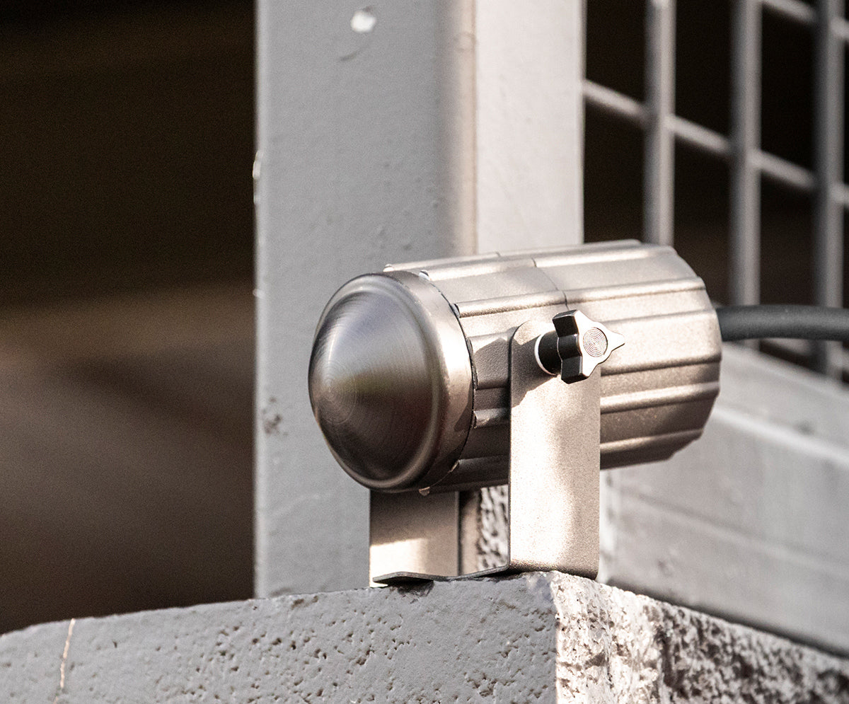 The Stalker Sport Pro II Speed Sensor mounted outside at a baseball field.
