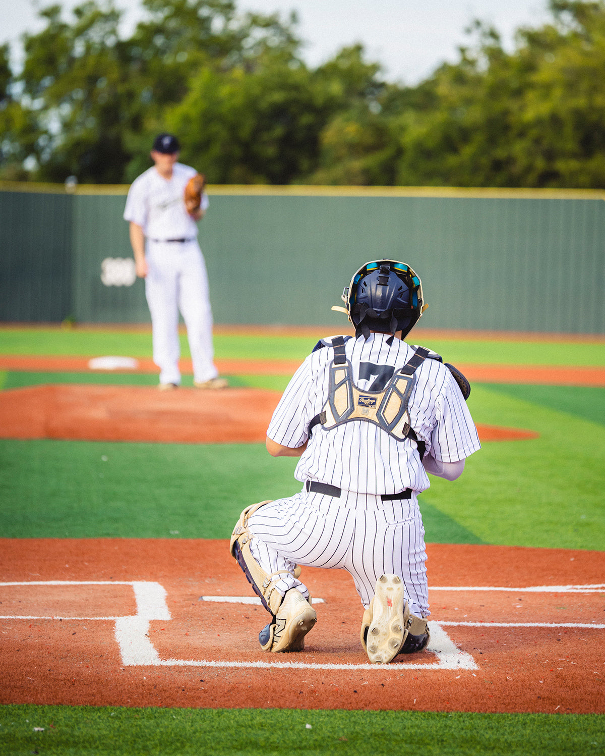 A pitcher and a catcher from the Team Stalker Sport baseball team.